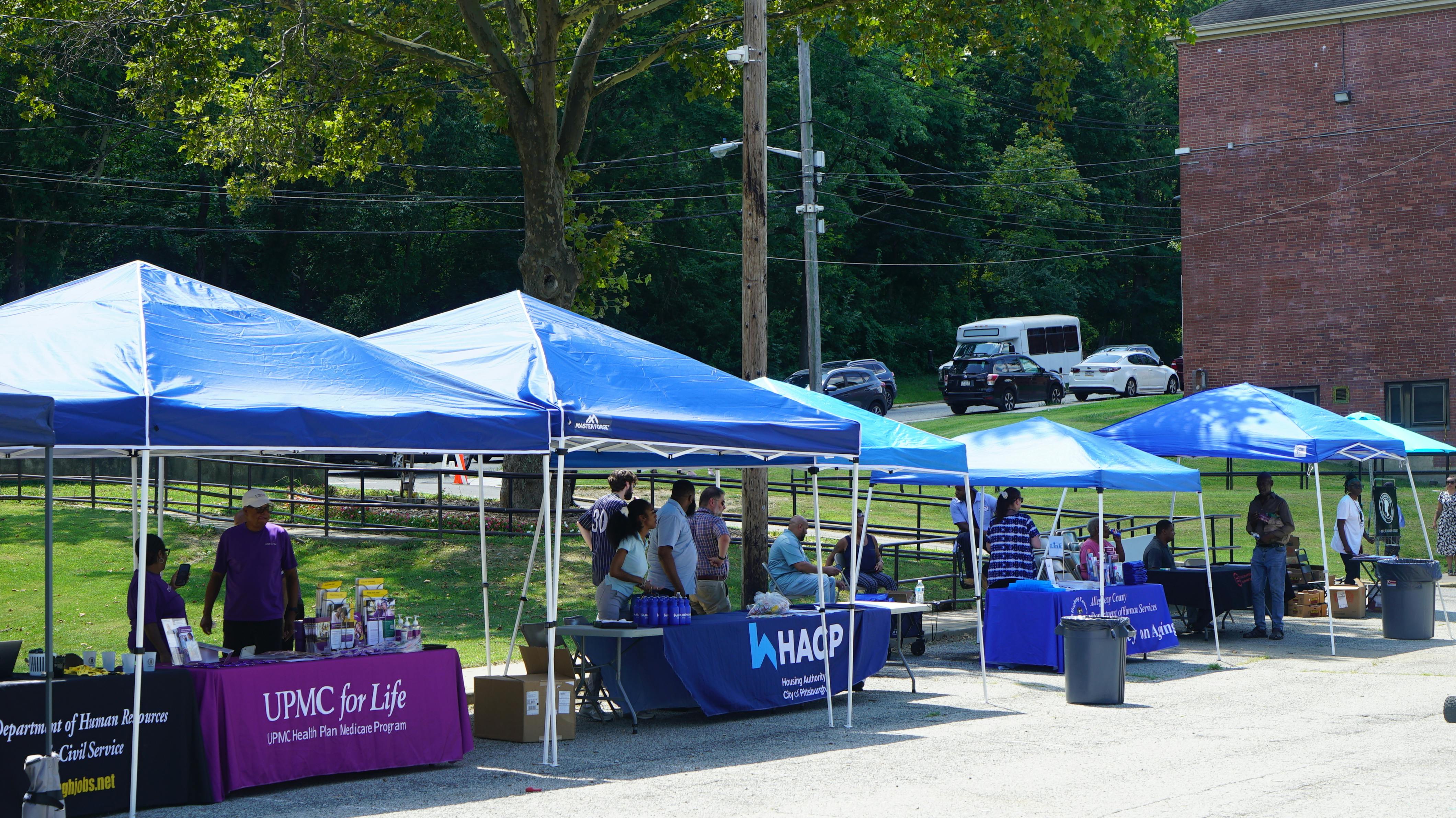 Service providers line up in their booths at an Arlington Heights Community Day.