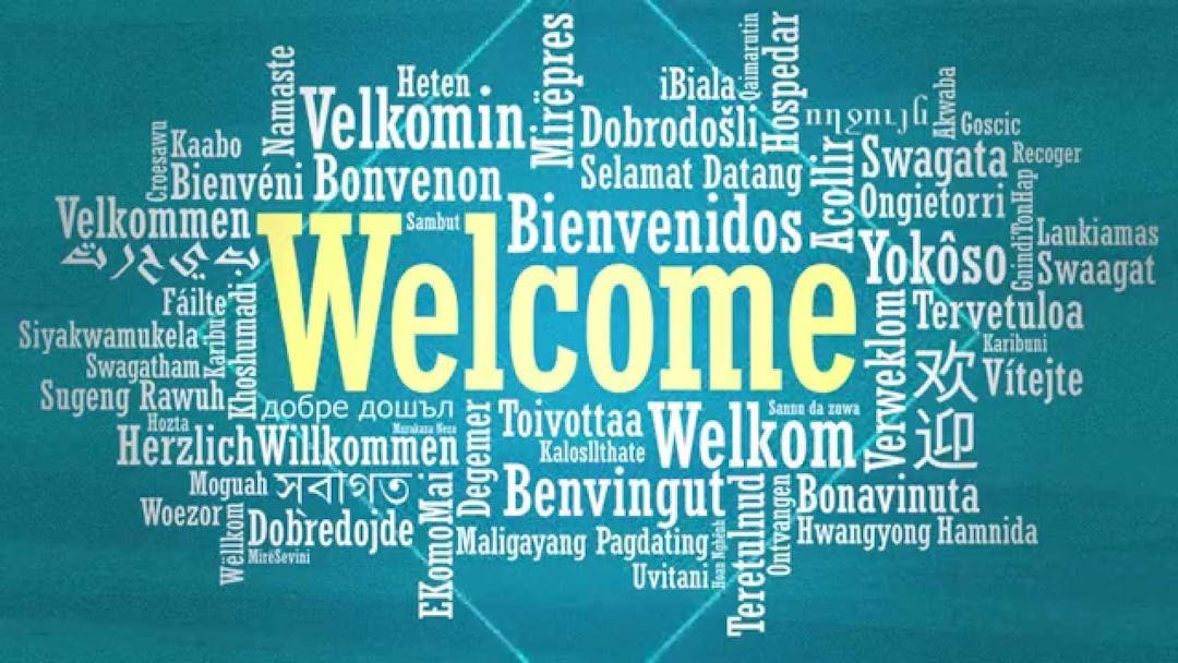 Image of welcome in multiple languages.