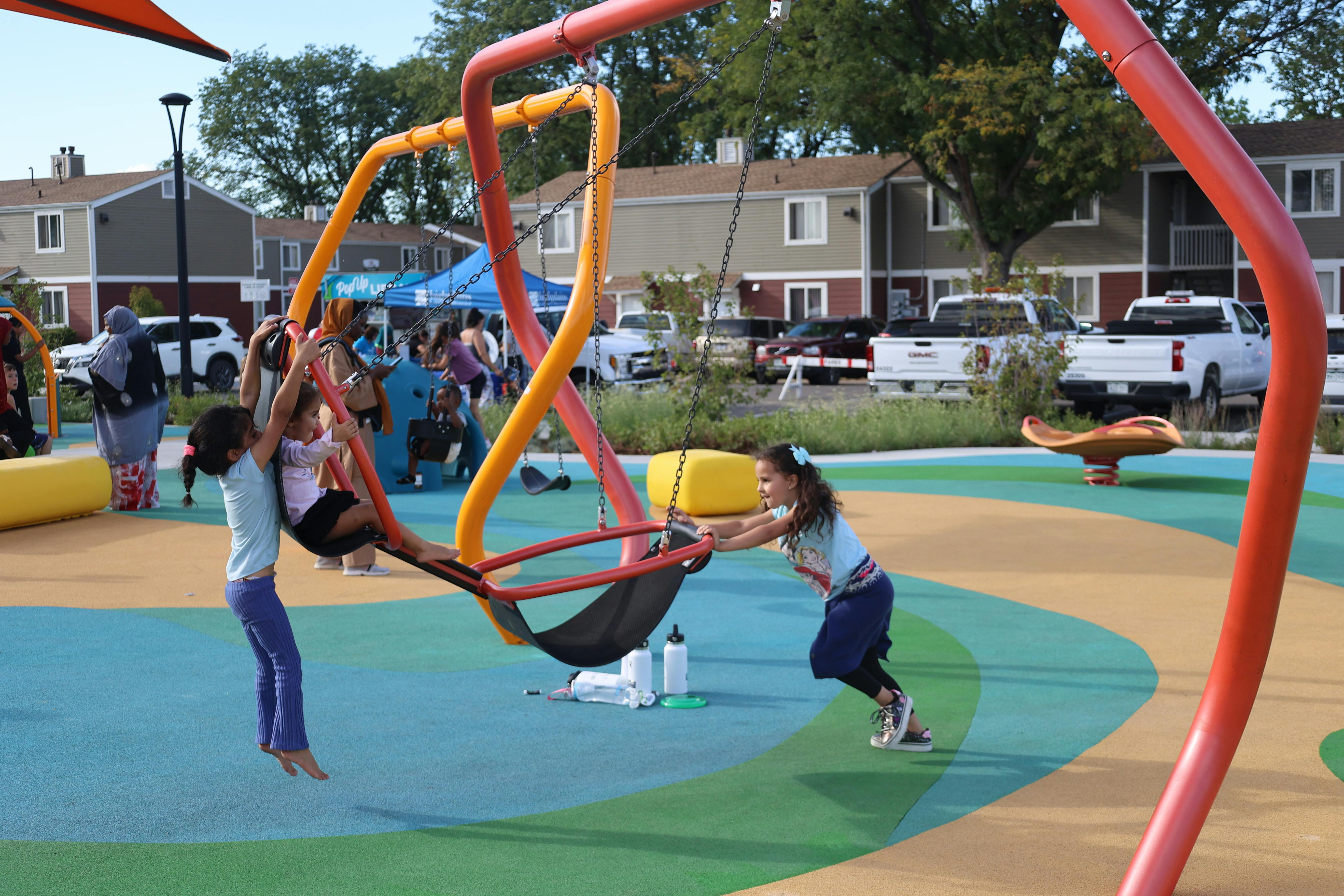 Delta Park Opening Girls on Swings