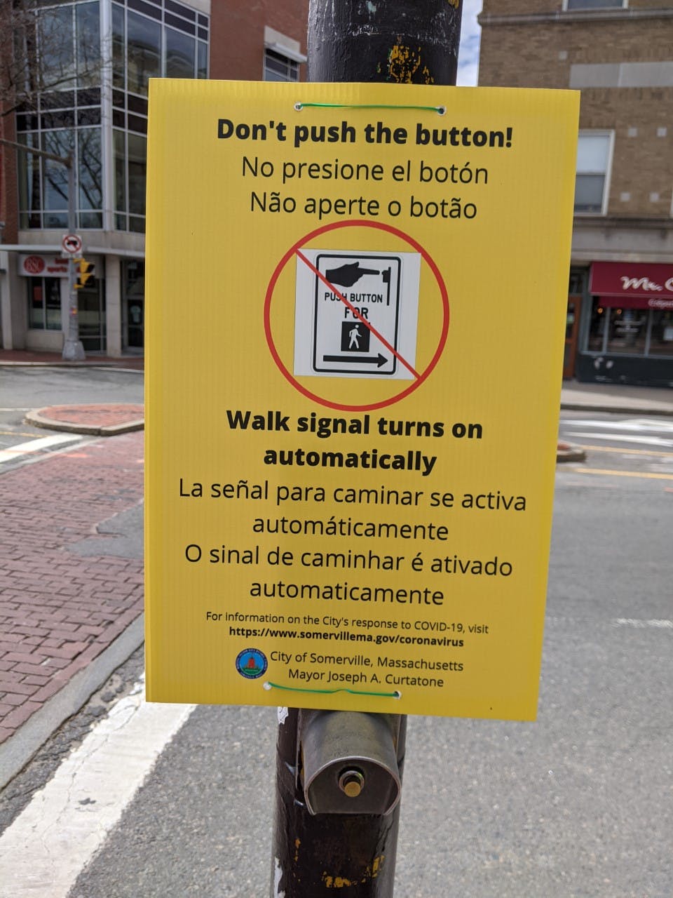 Automatic pedestrian signal sign