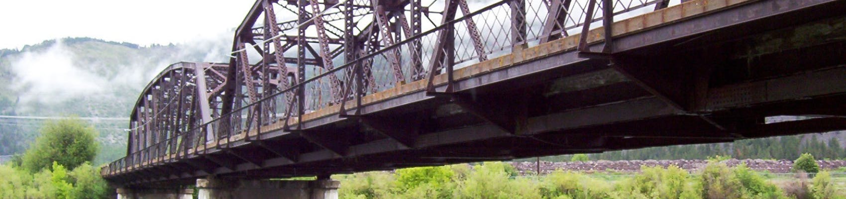 The Bonner-Milltown bridge on a cloudy day.