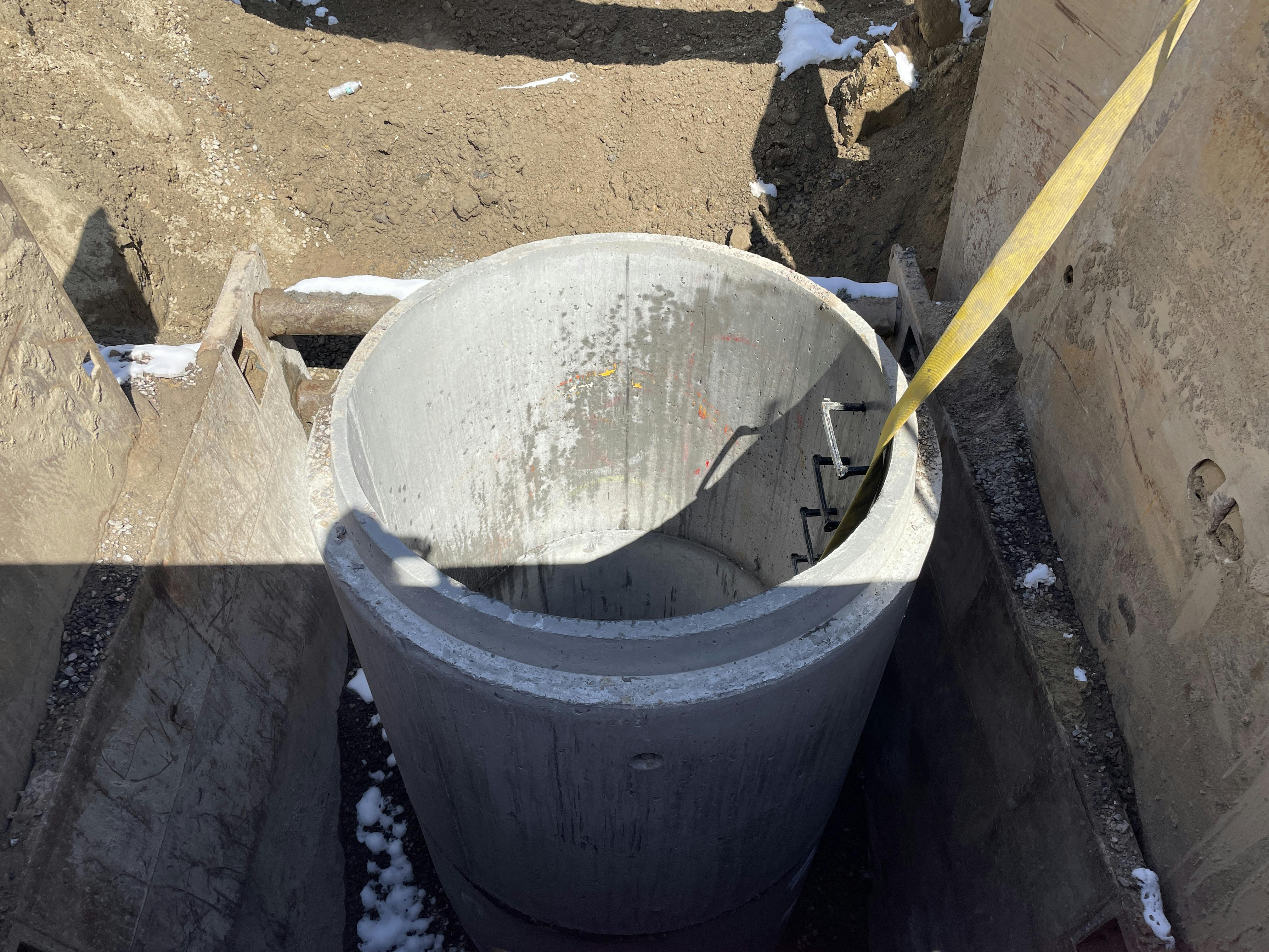March 2024 storm sewer manhole installation below Wadsworth 38th