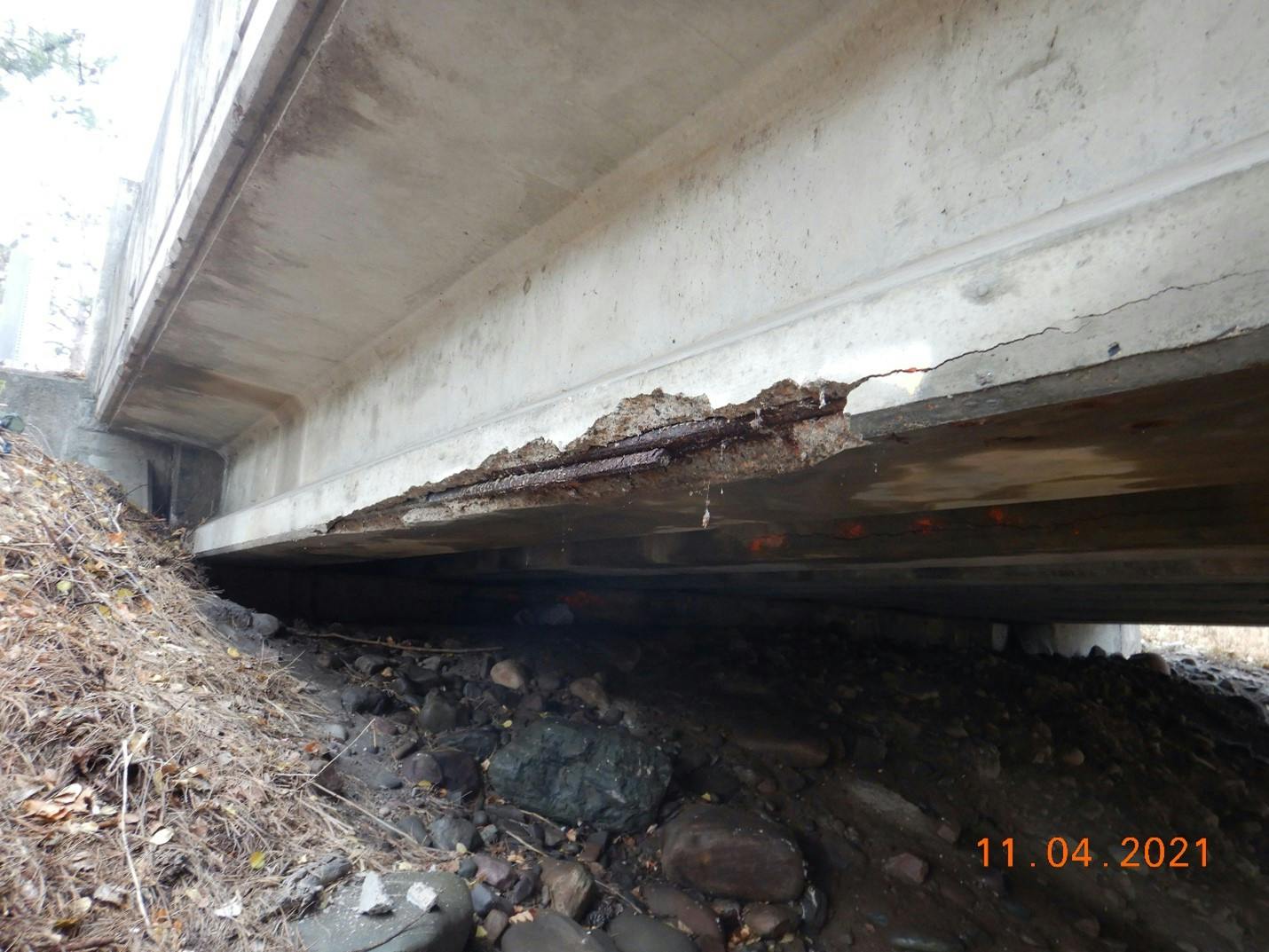 Exposed rebar on one of the prestressed beams