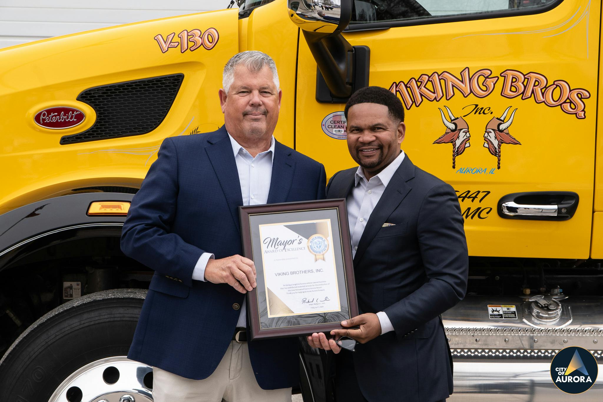 Mayor Richard C. Irvin presents Viking Brothers, Inc. with the Mayor's Award of Excellence