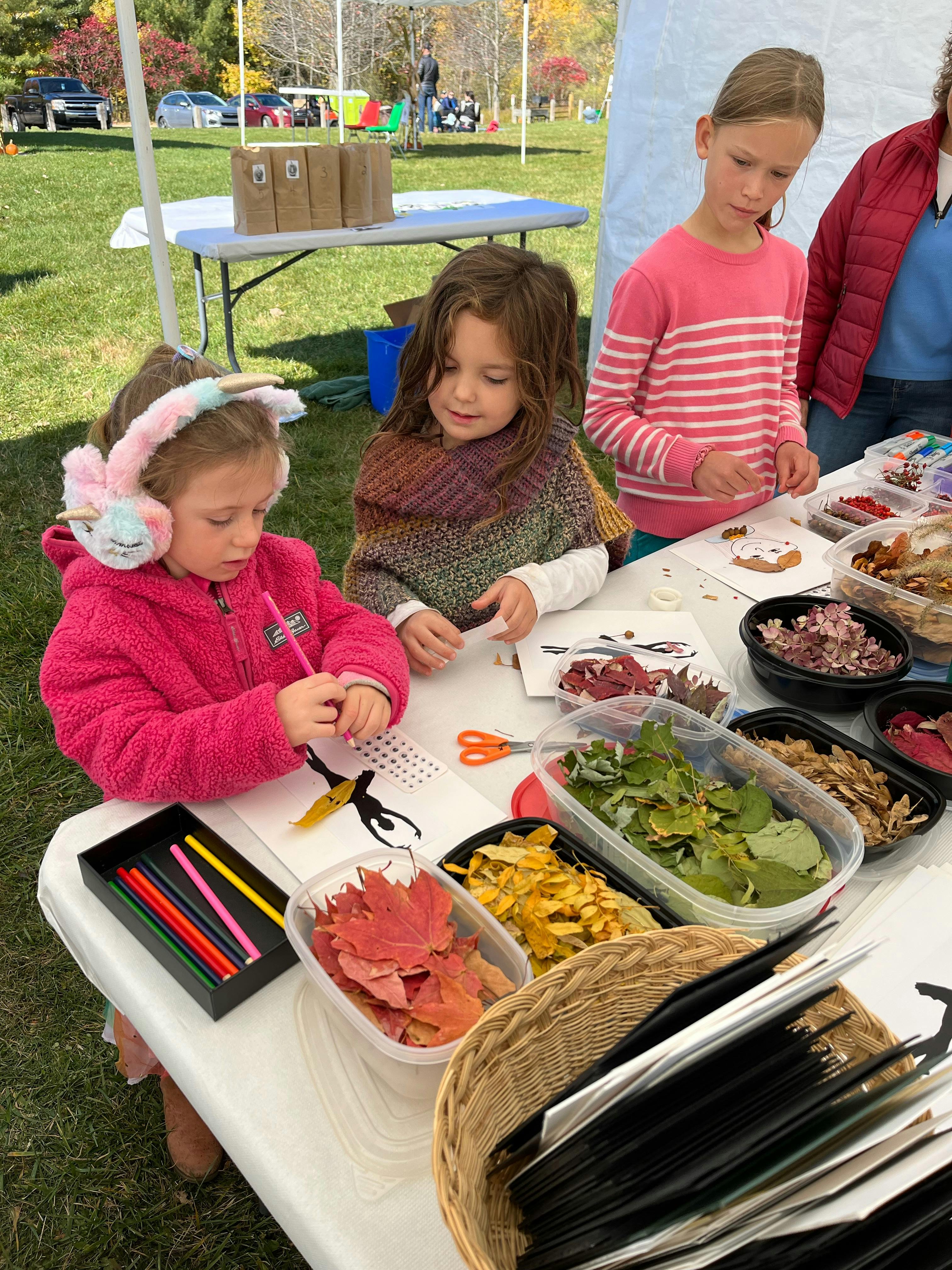 Kids creating in the art tent.jpeg