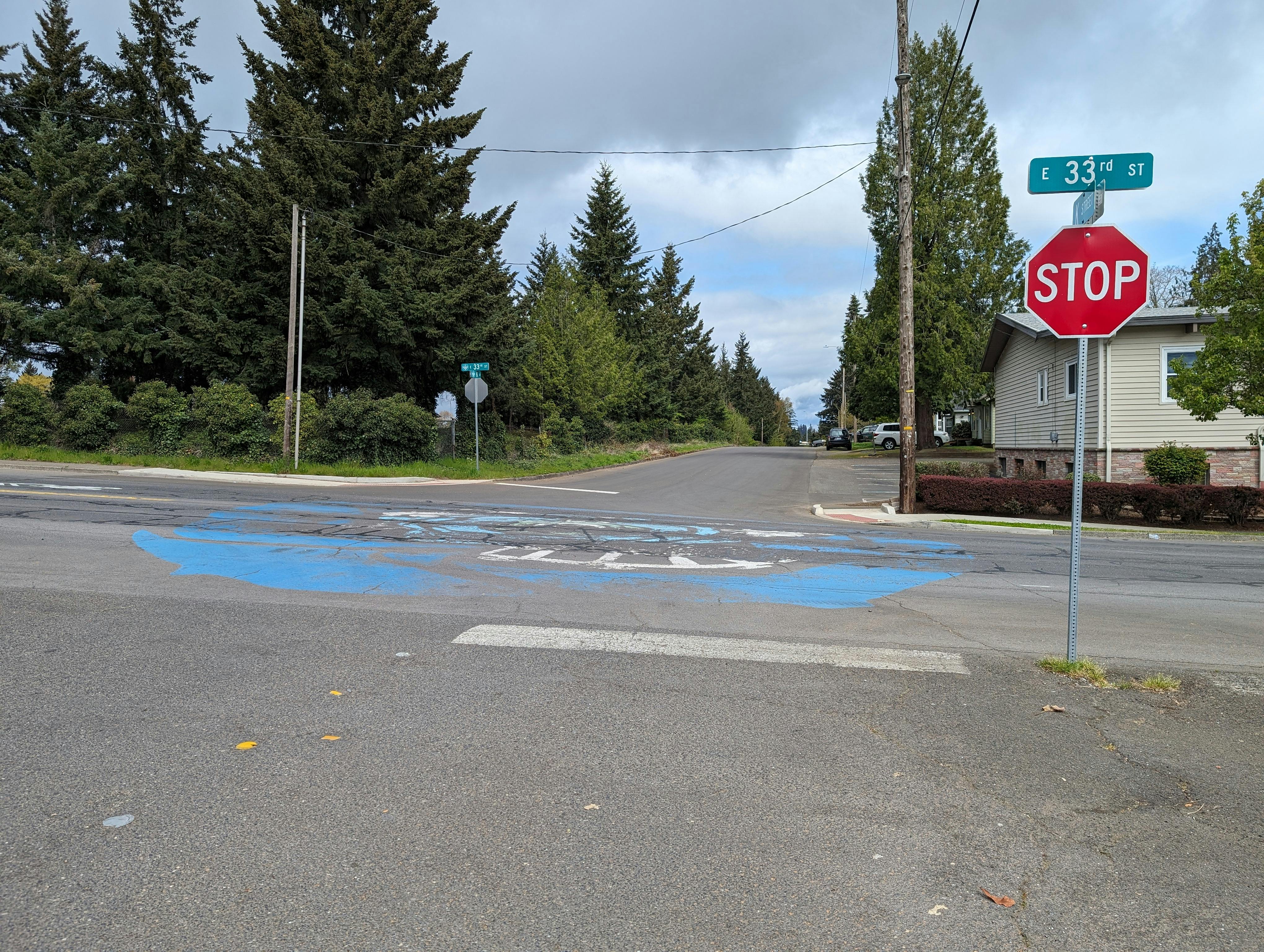 33rd Street features community intersection paintings, at K Street and R Street but both are fading.