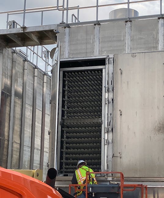A worker checks on progress as Aerator 4 goes into service.