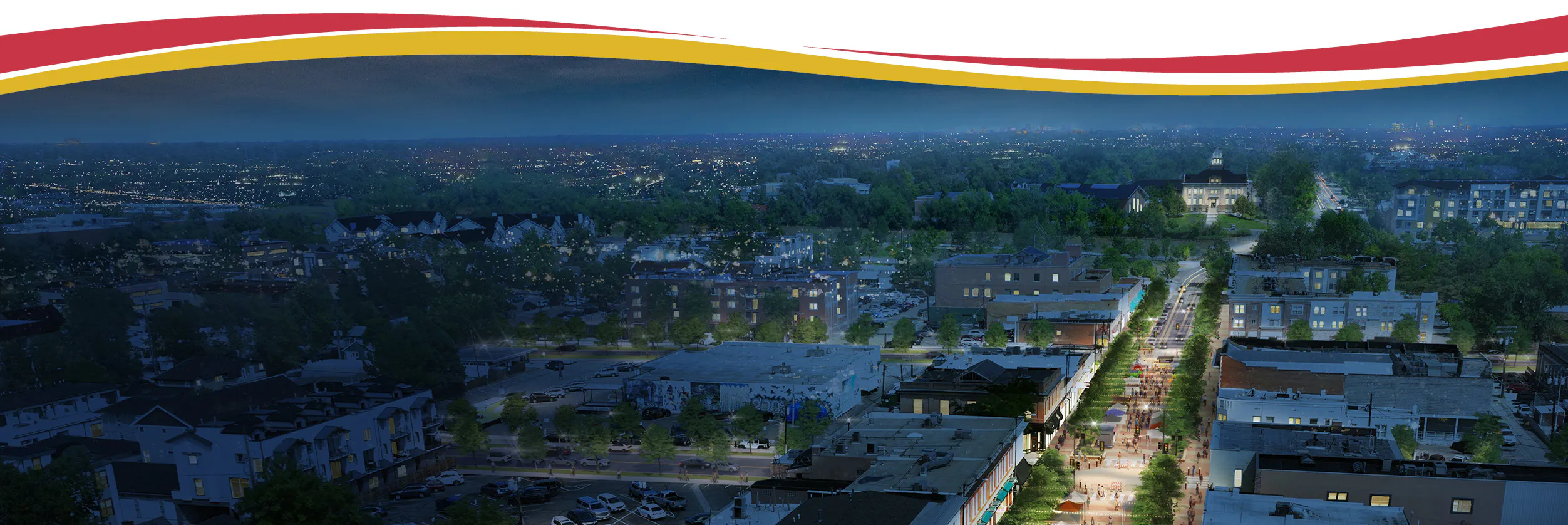 Wide street view on Littleton Boulevard, featuring cars, trees, and mid-century architecture.