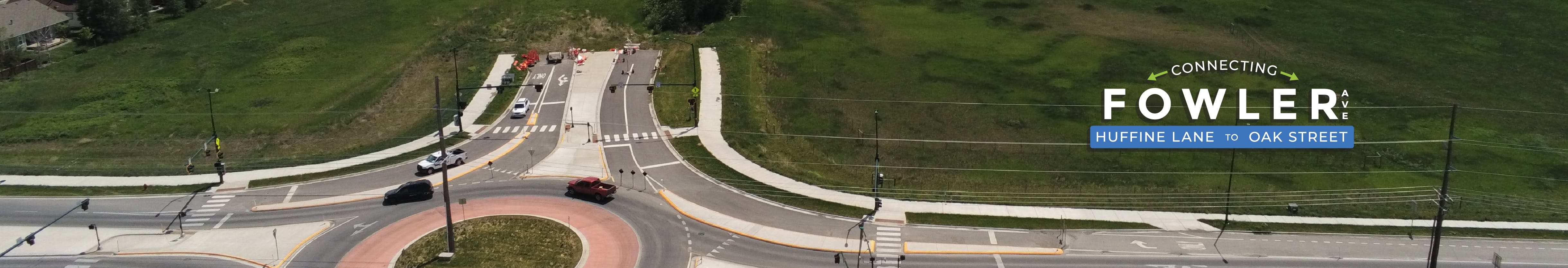 Roundabout with cars on it shows the missing connection where Fowler avenue would connect