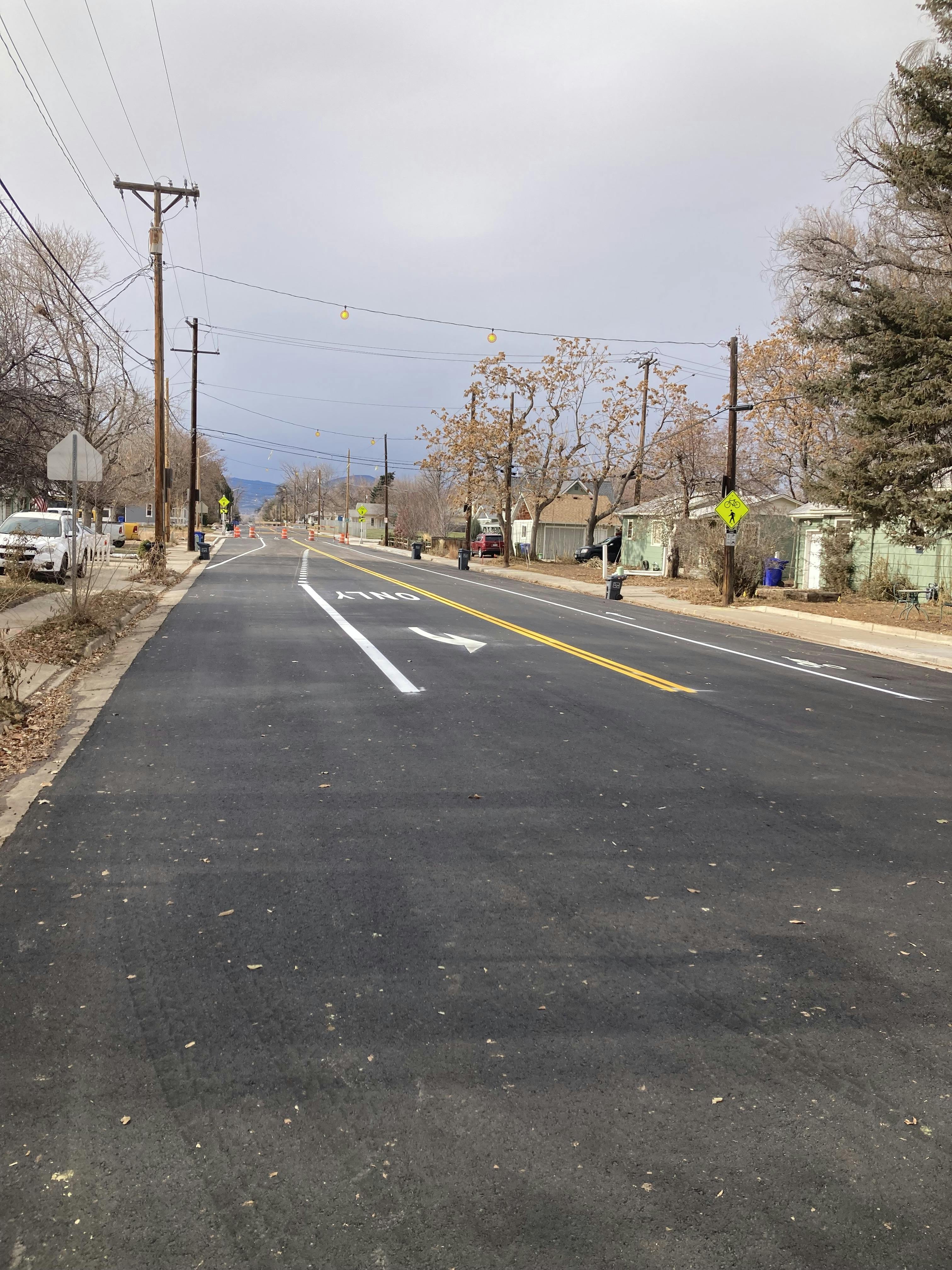 November 2022 - New asphalt and painted lines at Garfield Avenue and W. 1st Street