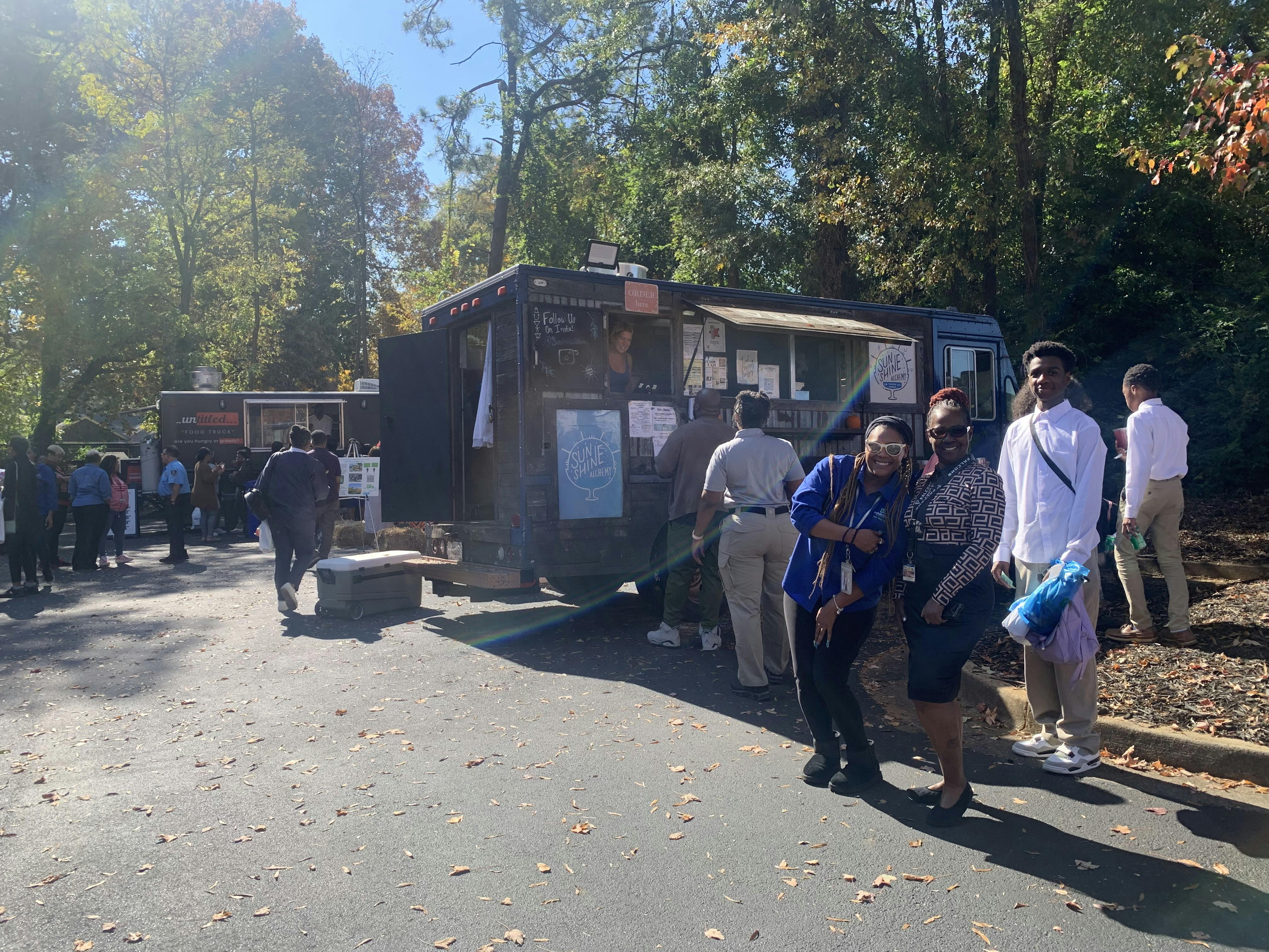 Untitled Food Truck and Sunshine Alchemy providing food to guests