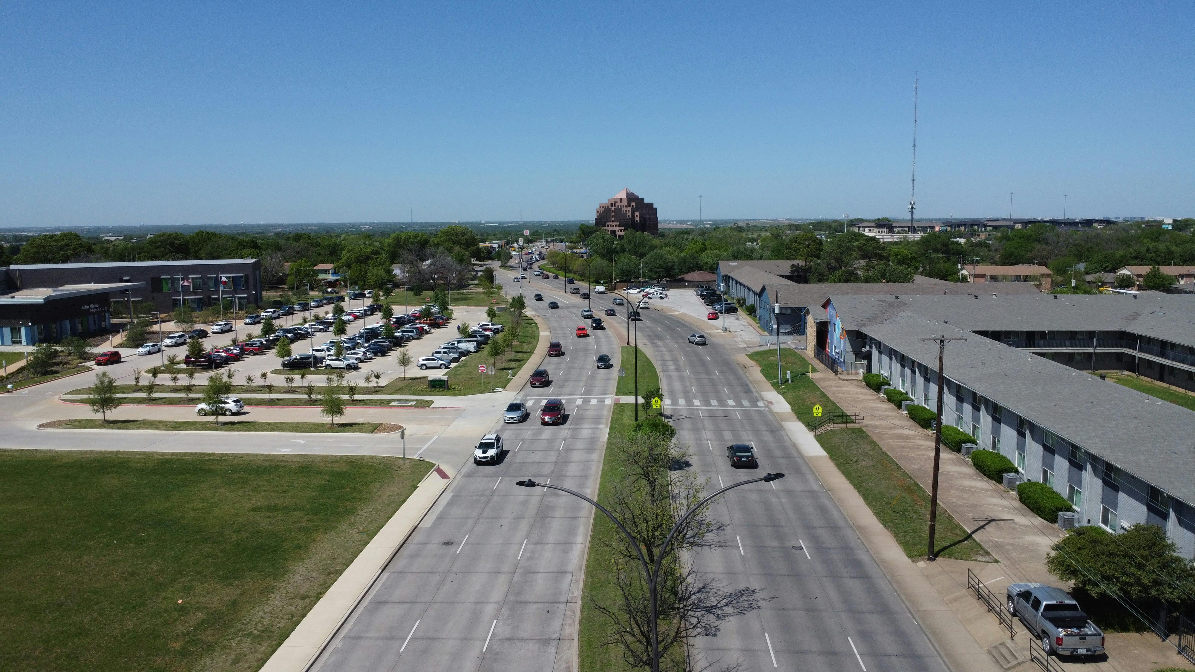 Divided roadway with sidewalks and crosswalks