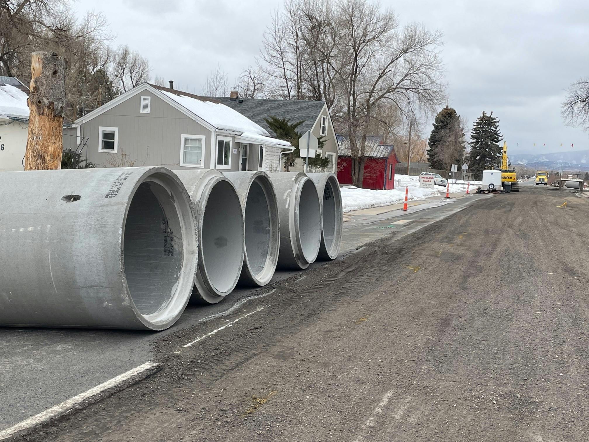 February 1, 2022 – Materials are being delivered to the project site and include large reinforced concrete pipes for the storm drain replacement.