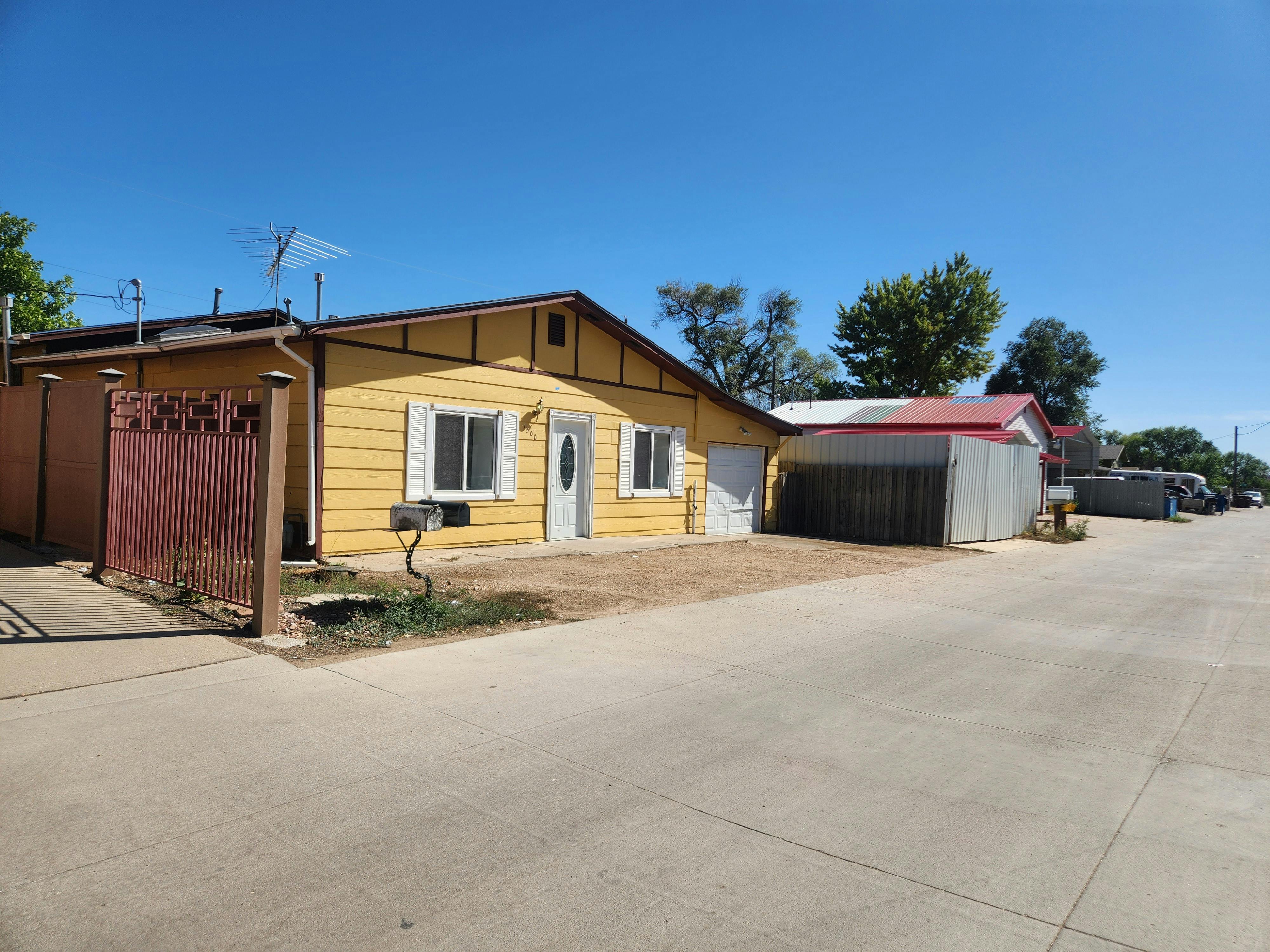 Yellow house in the Spanish Colony neighborhood.