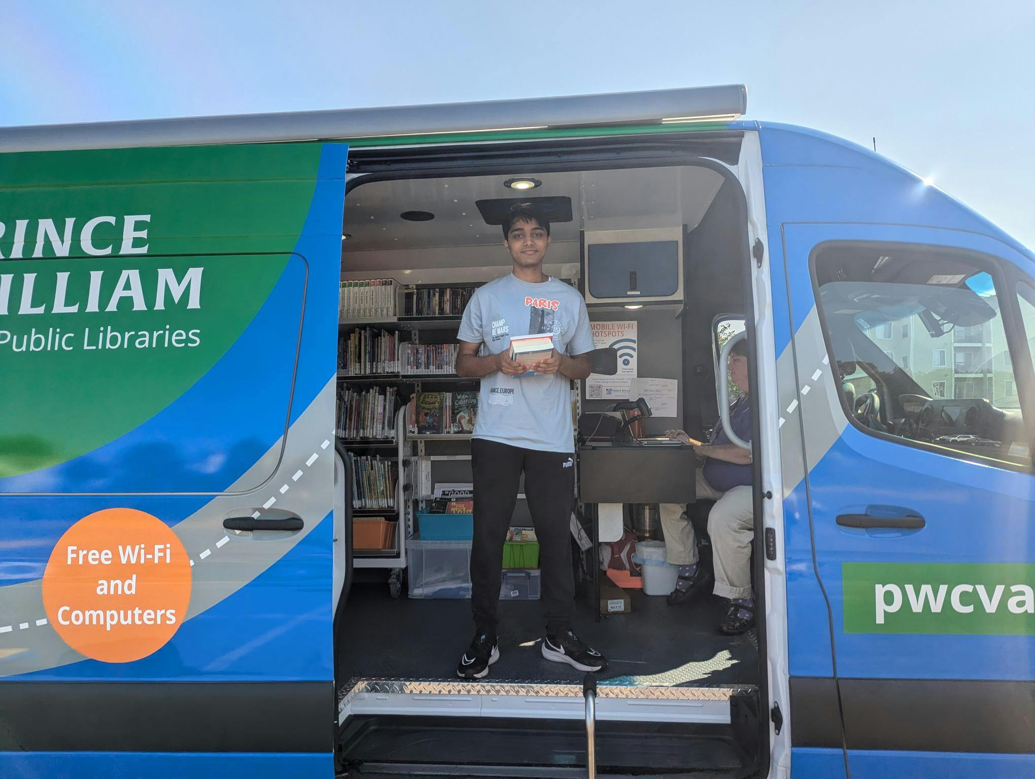 Young person in Prince William Public Libraries mobile library van