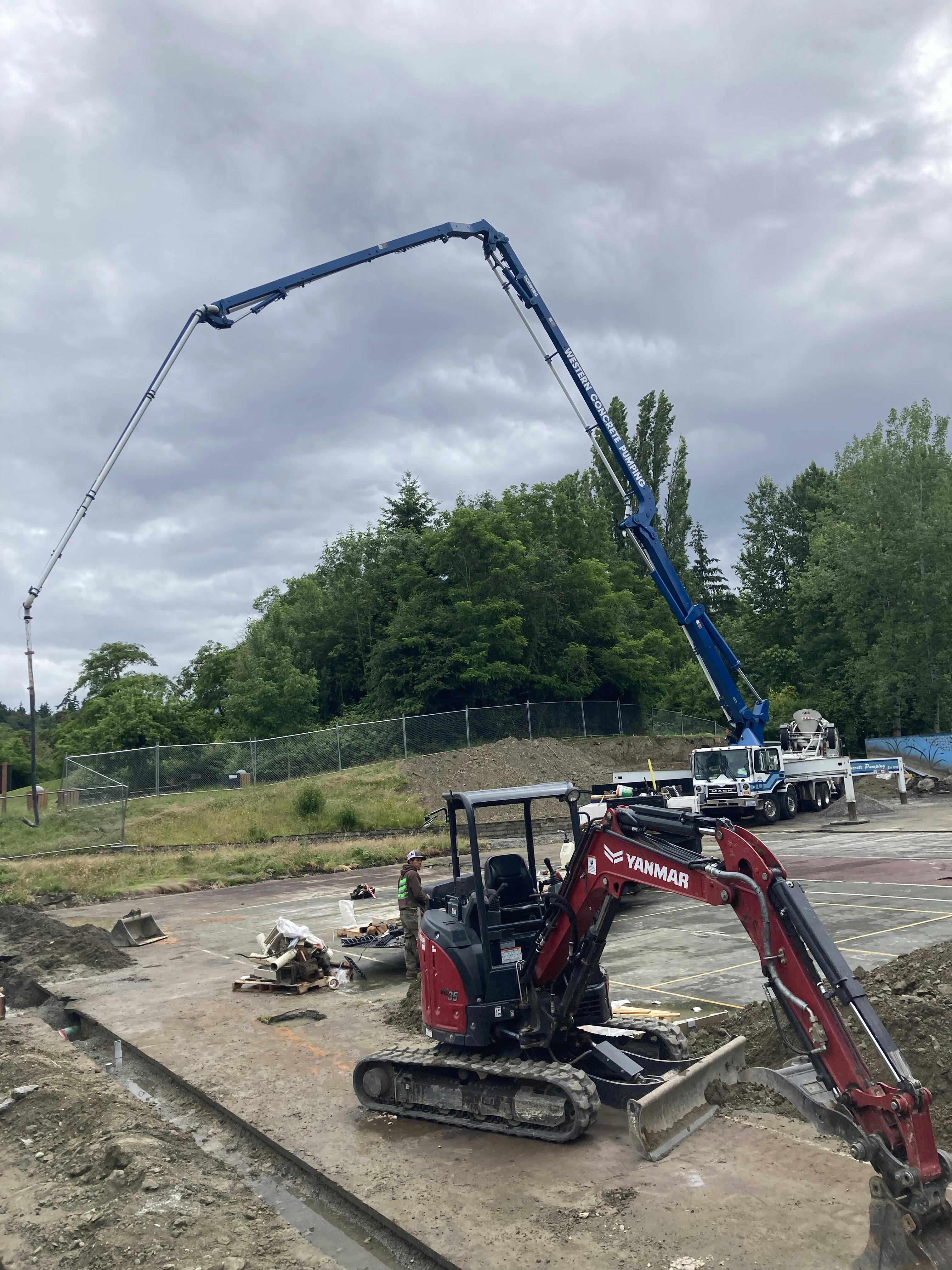 Pouring concrete for trench drain system