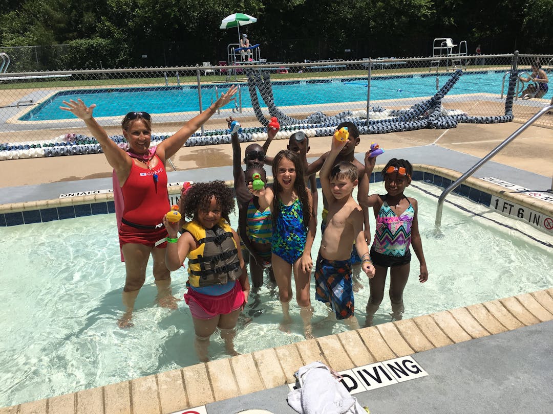 Crawford Park Pool Kids and adults swimming in Crawford Park Pool.