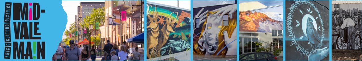 Mural festival with people walking, street banners, murals