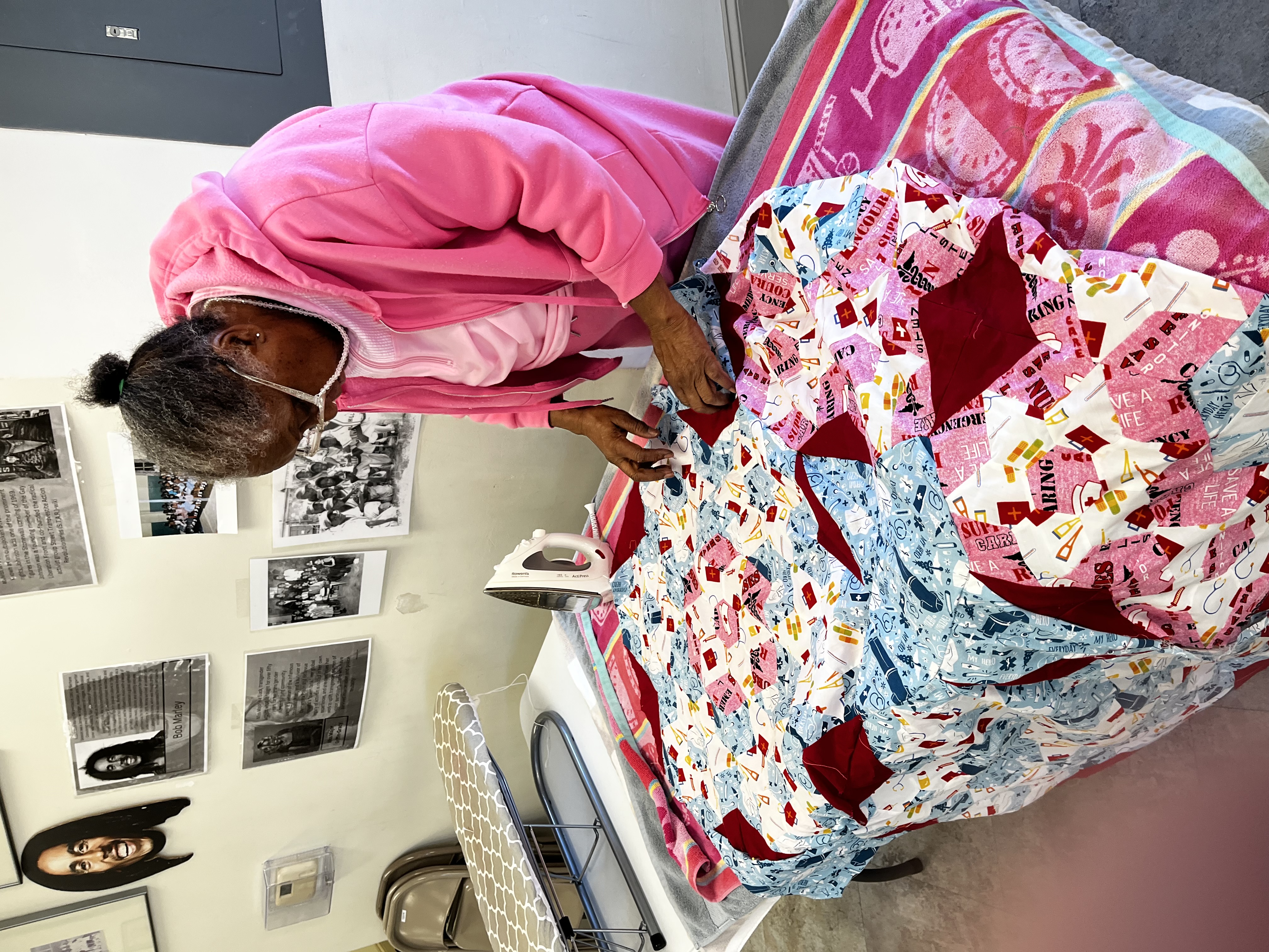 Woman working on creating a quilt