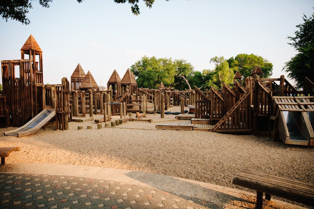 Creative Playground at Virginia Weaver Park Original wooden play structure, located at Virginia Weaver Park.