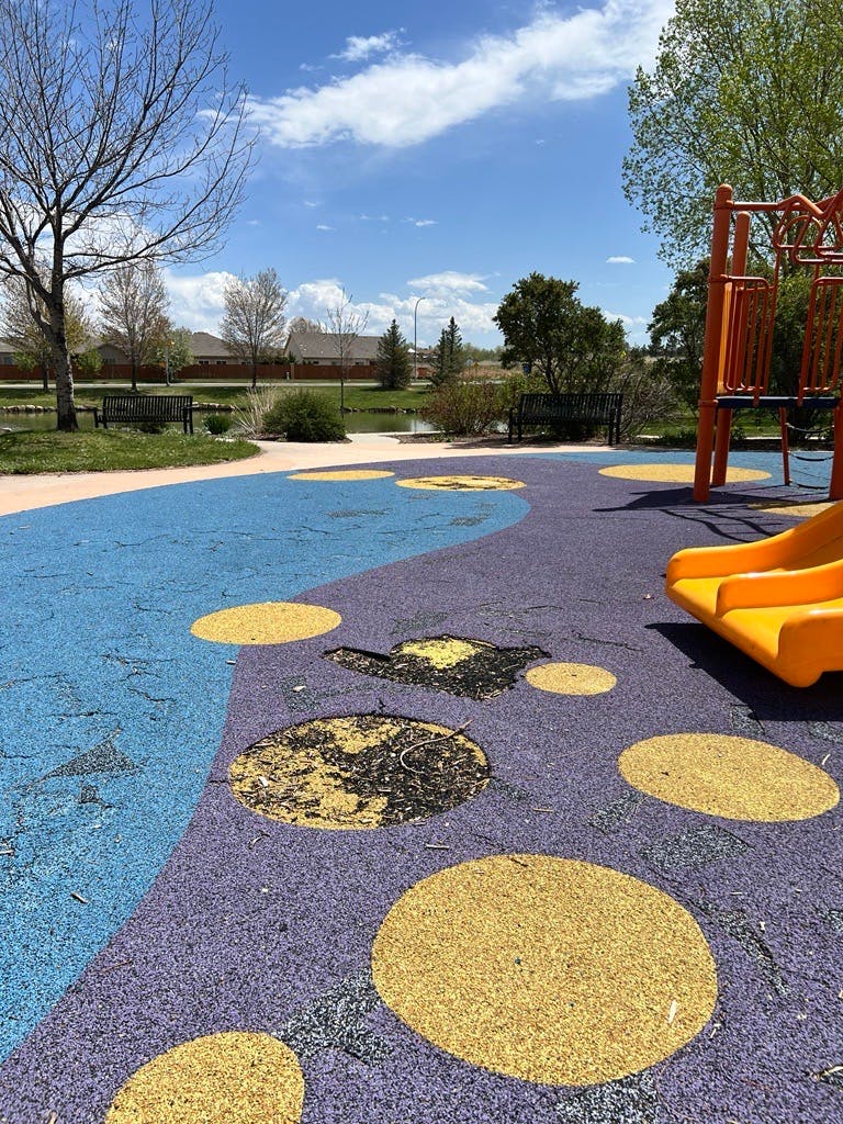 damaged play surface twin rivers.jpeg