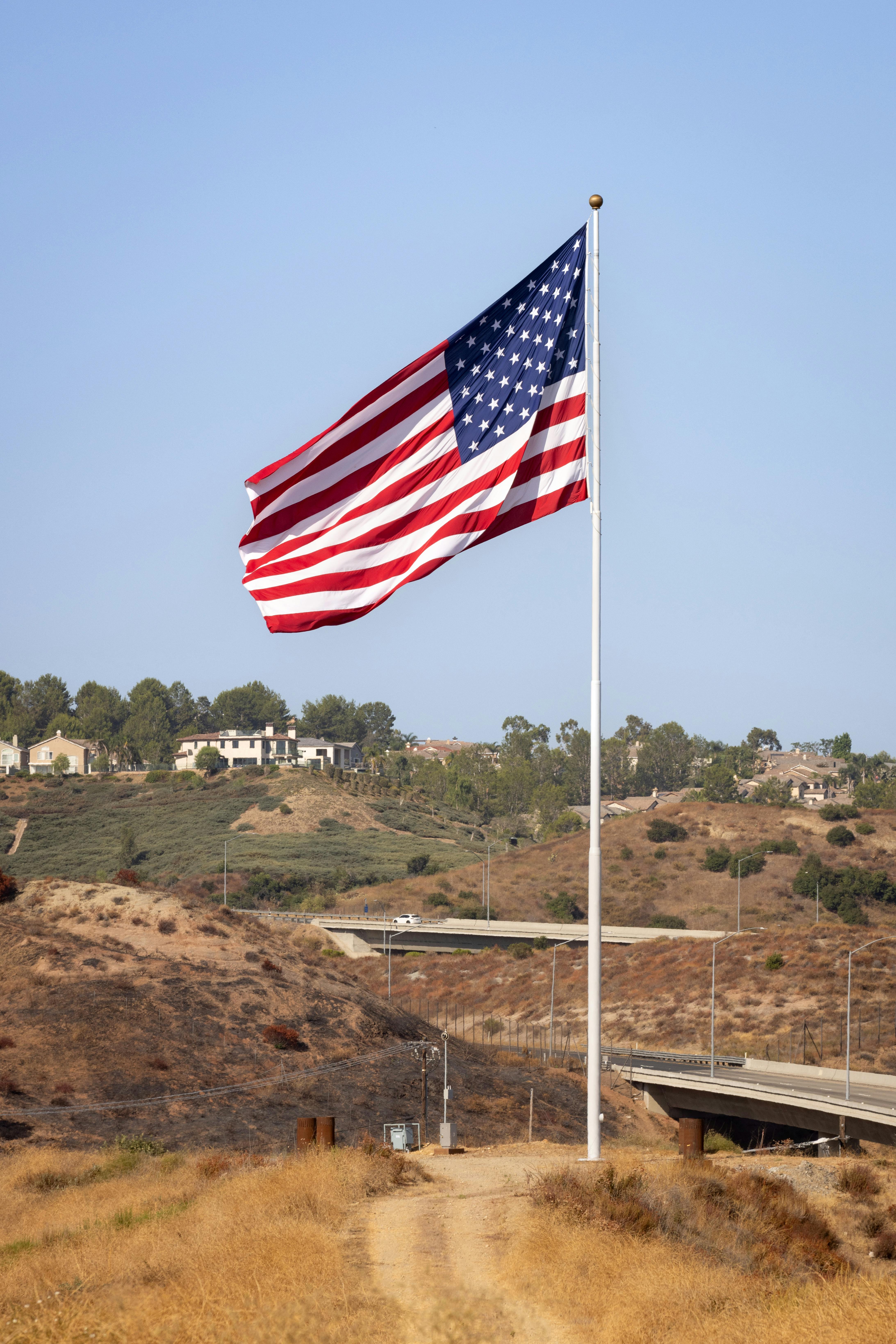 View of Flag with Anaheim Hills in the background