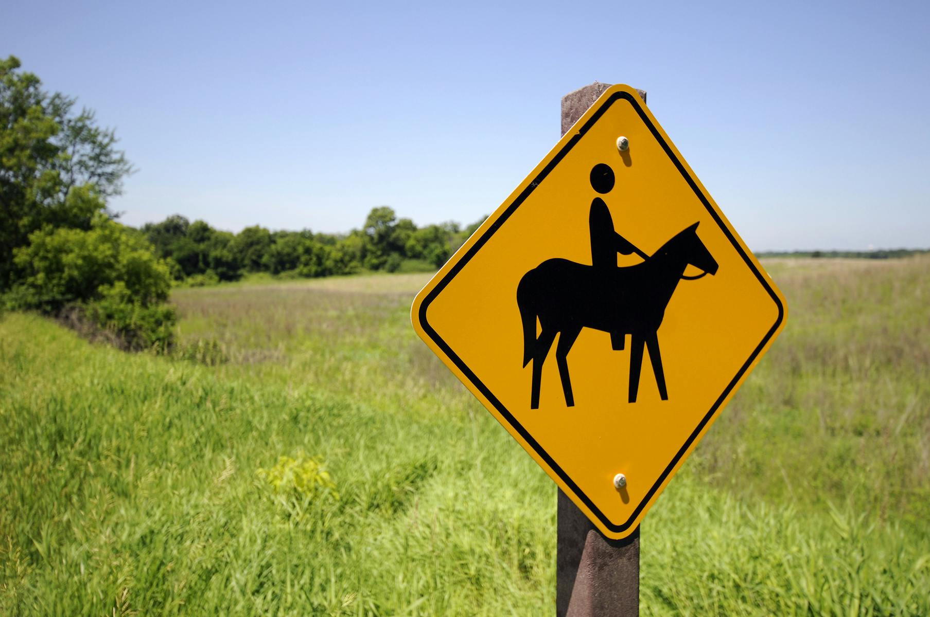 Crow-Hassan horseback signage