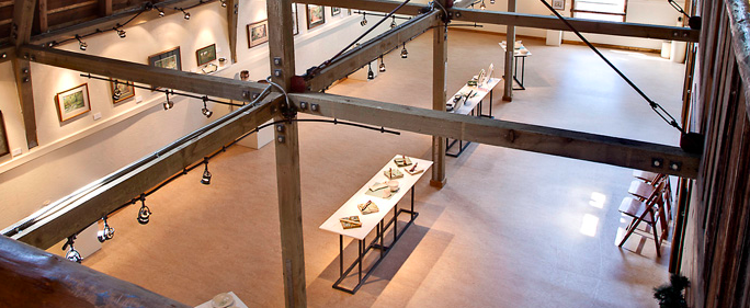 Fully finished barn with walls and interior setup for exhibit space