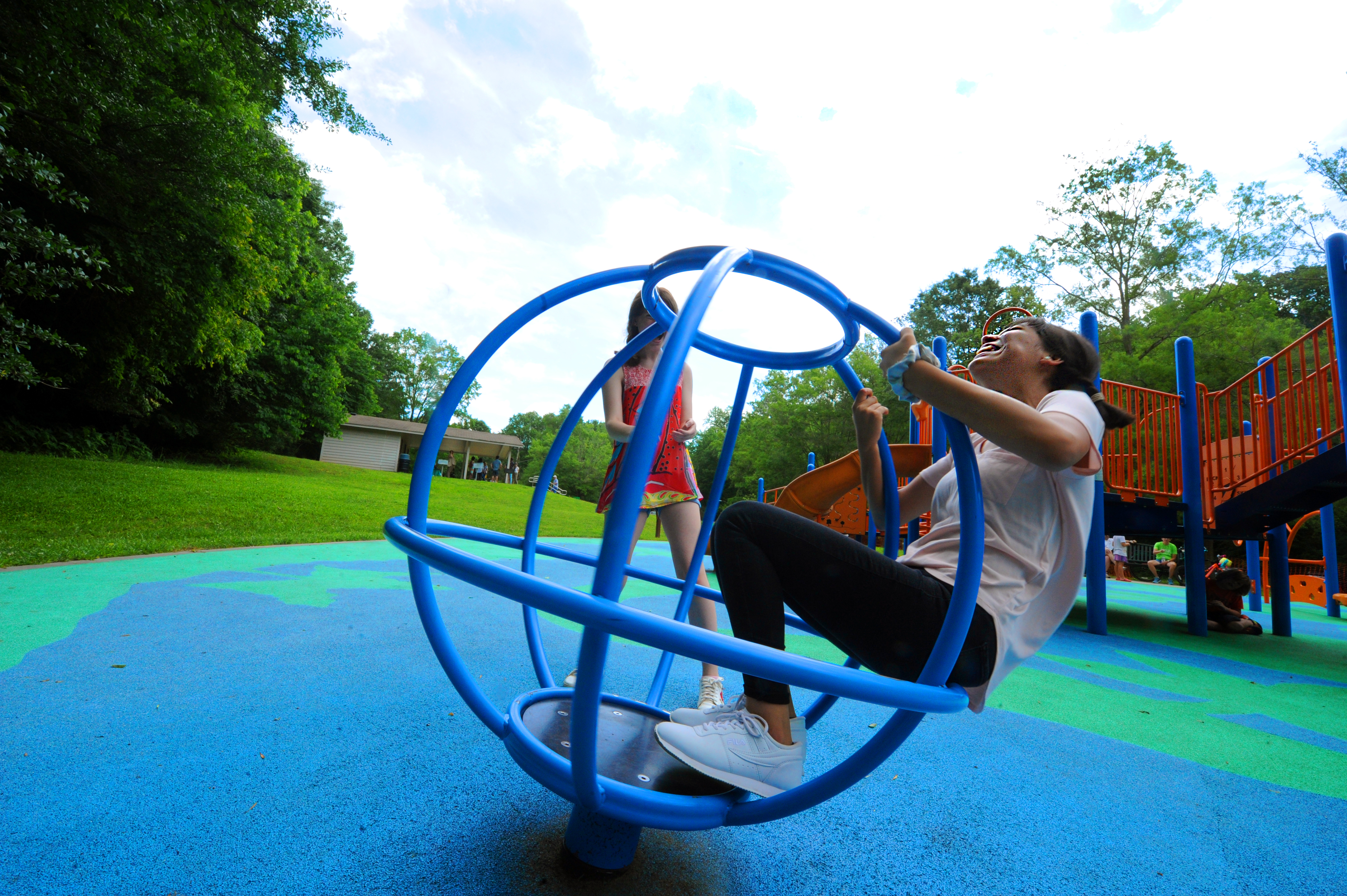 Photo of kids playing on playground structure