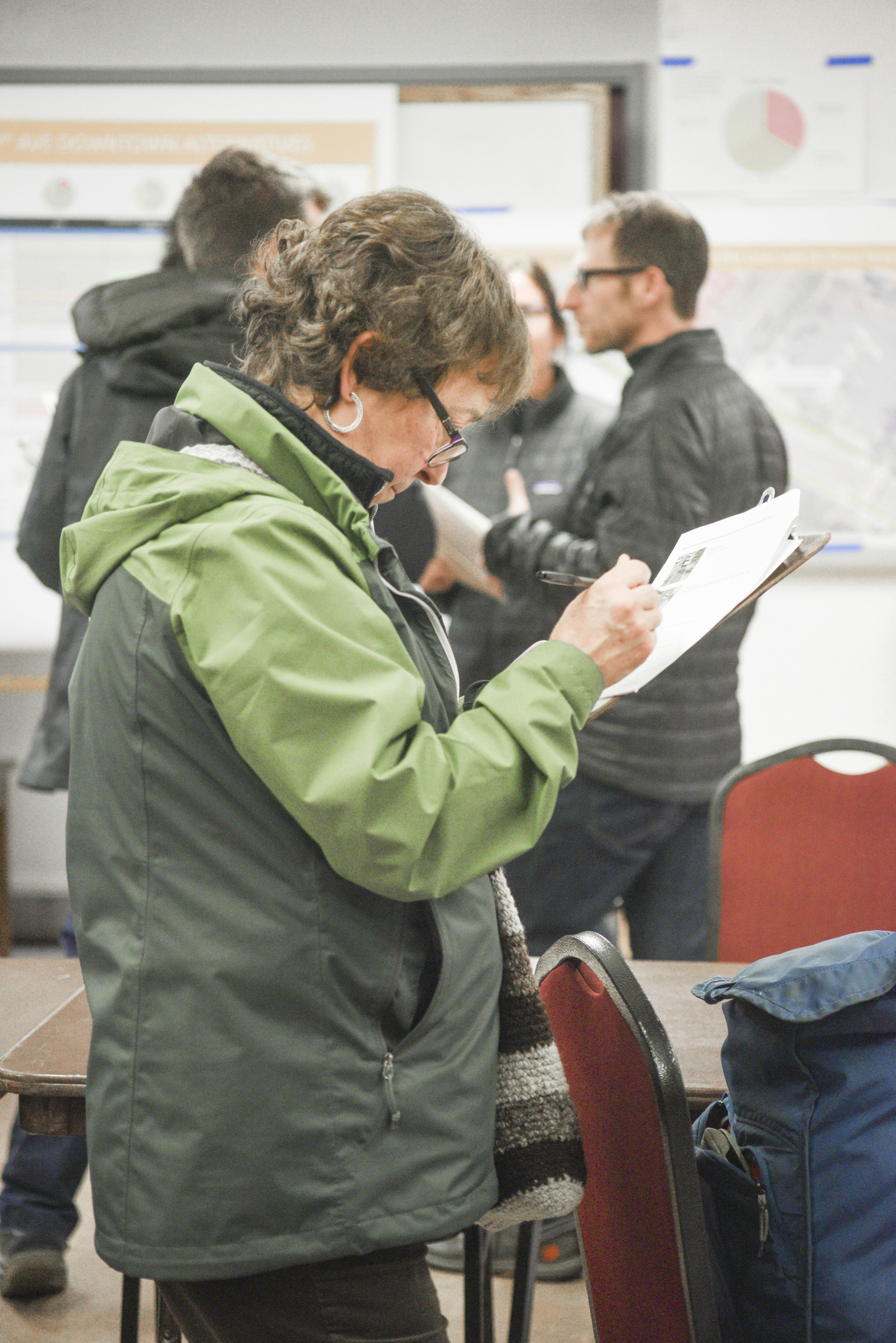 Community members learn more about the design alternatives at the Central Eugene in Motion November Open House.