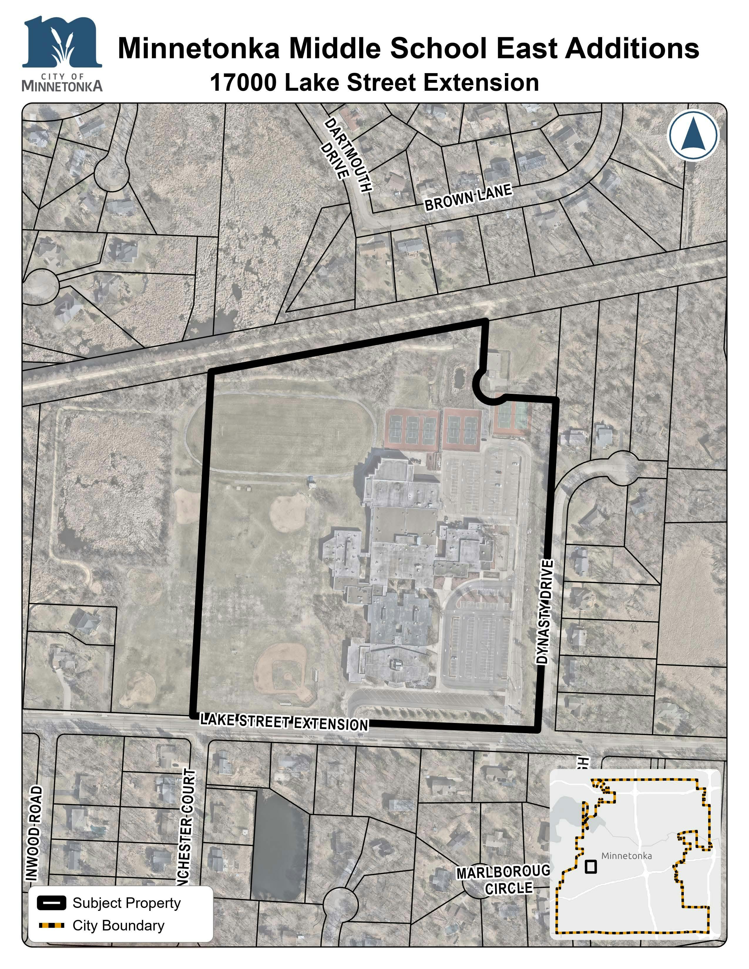 A map showing Minnetonka Middle School East and its grounds outlined in black, bordered by Lake Street Extension, Inwood Road, and Oak Knoll overpass. An inset map shows its location within Minnetonka.