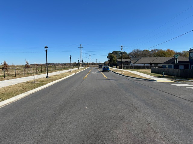 West view of Deane Street, two travel lanes and center turn lane)