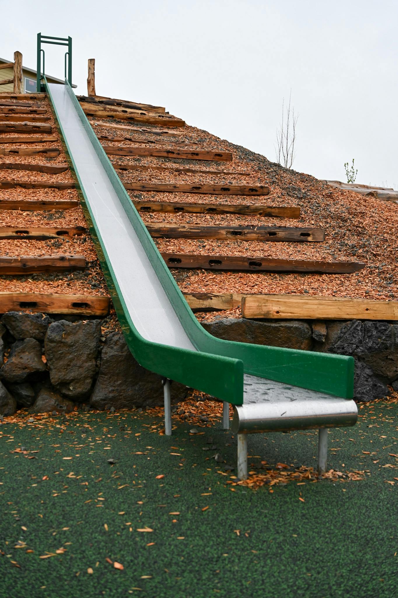 A long hill slide at Storybook Hollow Park.