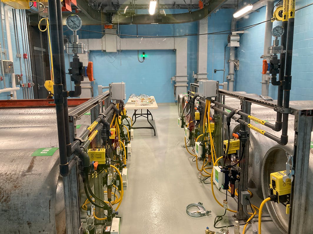Taken from behind an observation window, chlorine tanks are hooked to pumps. The chemical building is expected to begin adding disinfectants -- chlorine, liquid ammonium sulfate and fluoride -- before the end of the month.