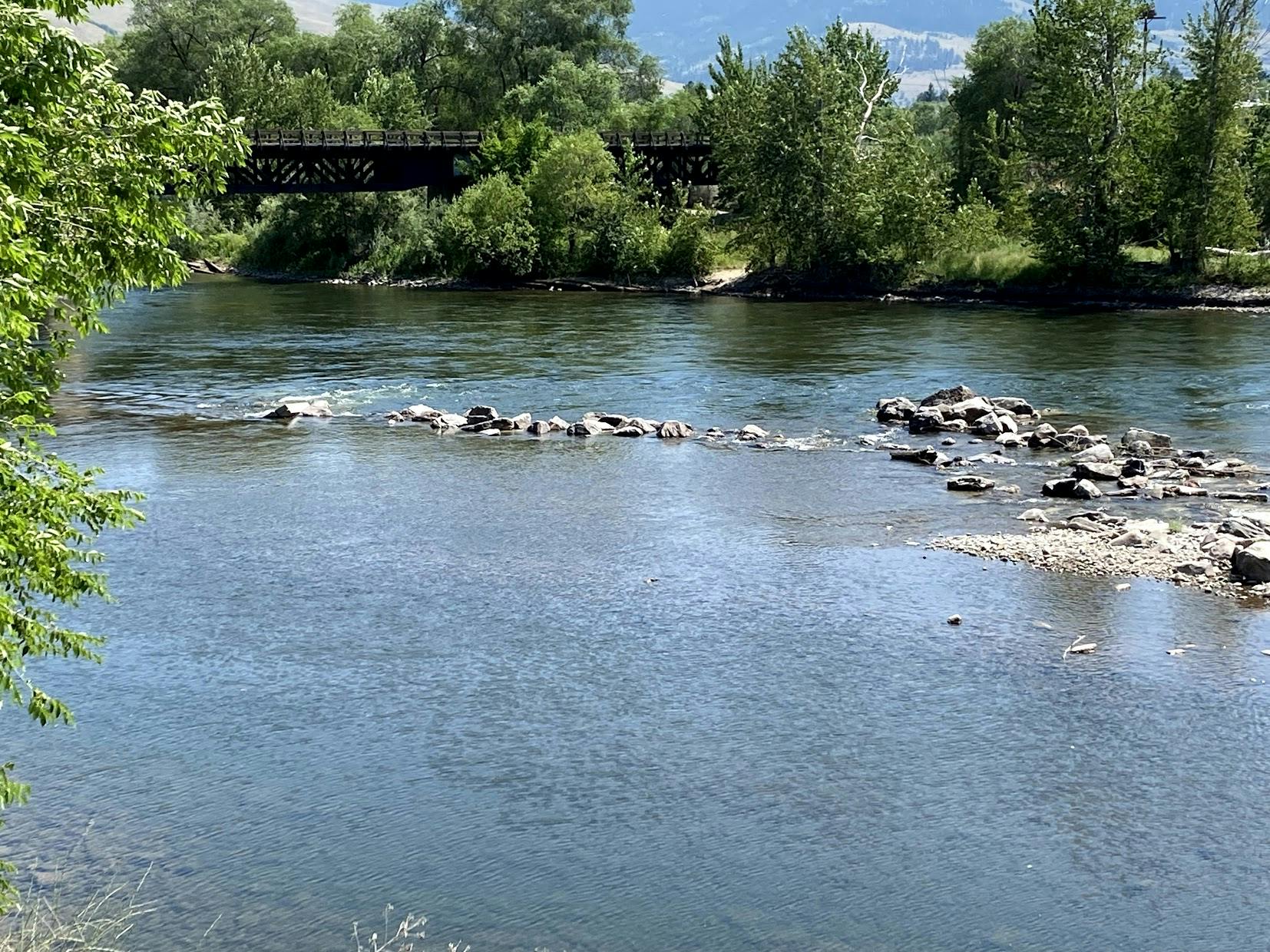 Flynn-Lowney Ditch diversion using rock and jersey barrier.