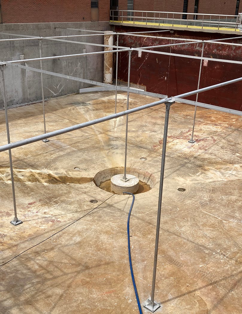 The skeleton is set for the baffle curtain to be installed in Secondary Basin 2.
