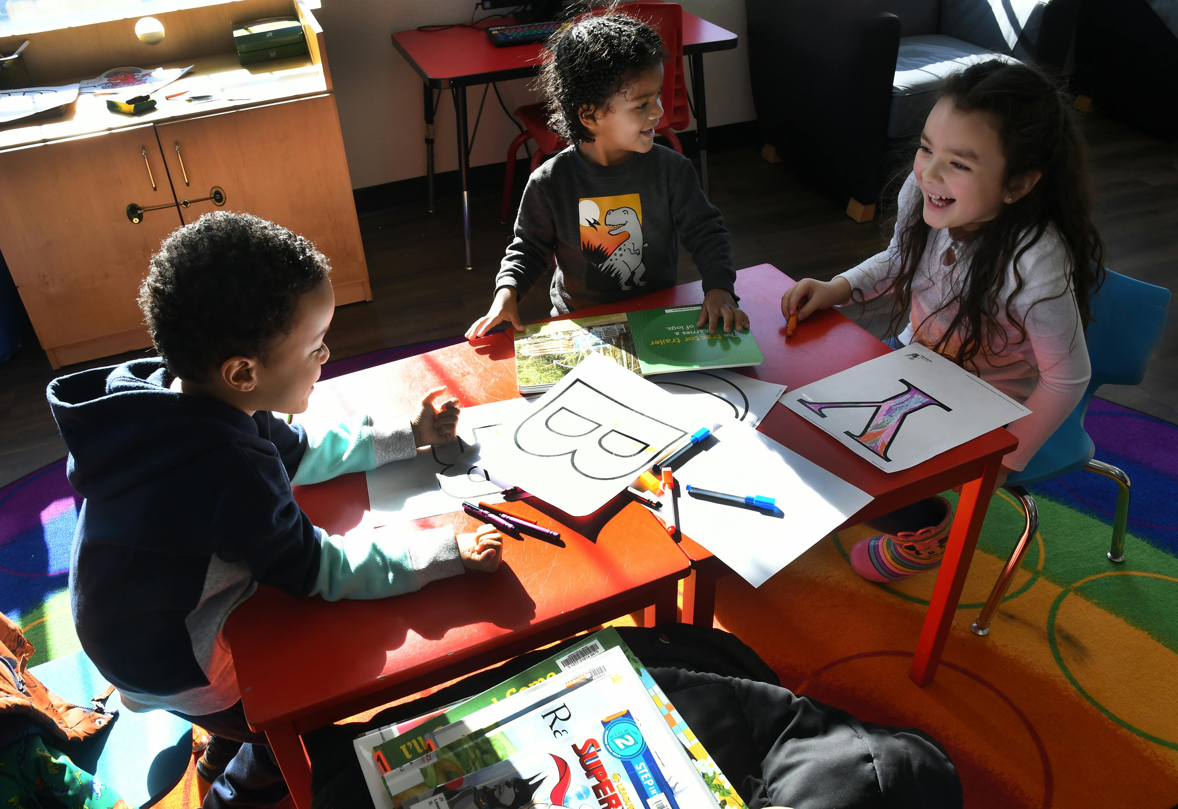 Children enjoying a craft at Chambers Plaza Library