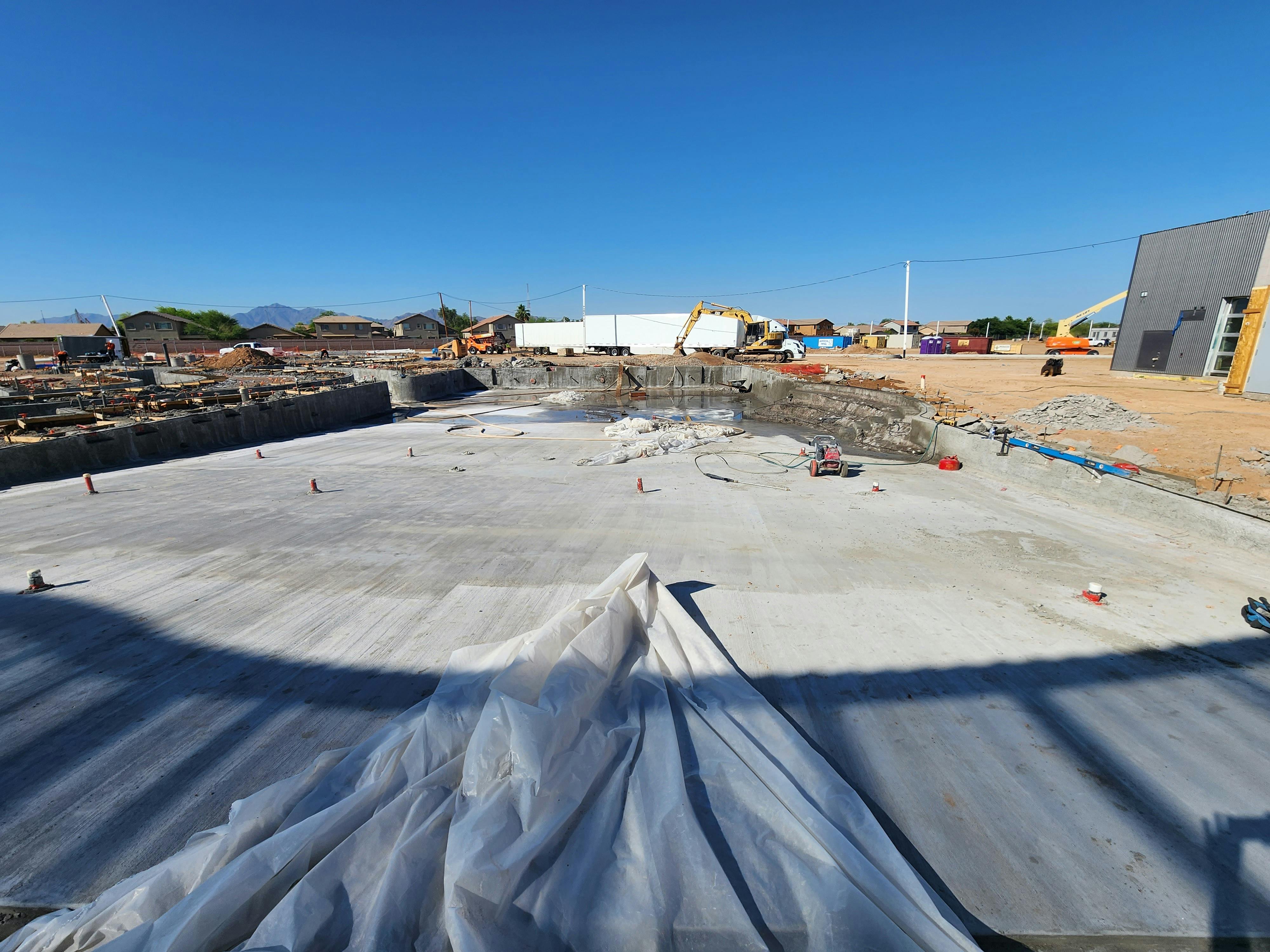 June 12 leisure pool concrete installed.jpg
