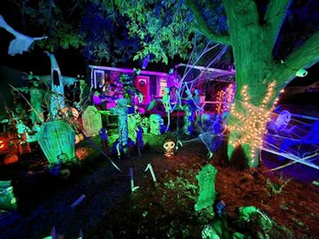 Image of Halloween decorations in front of house
