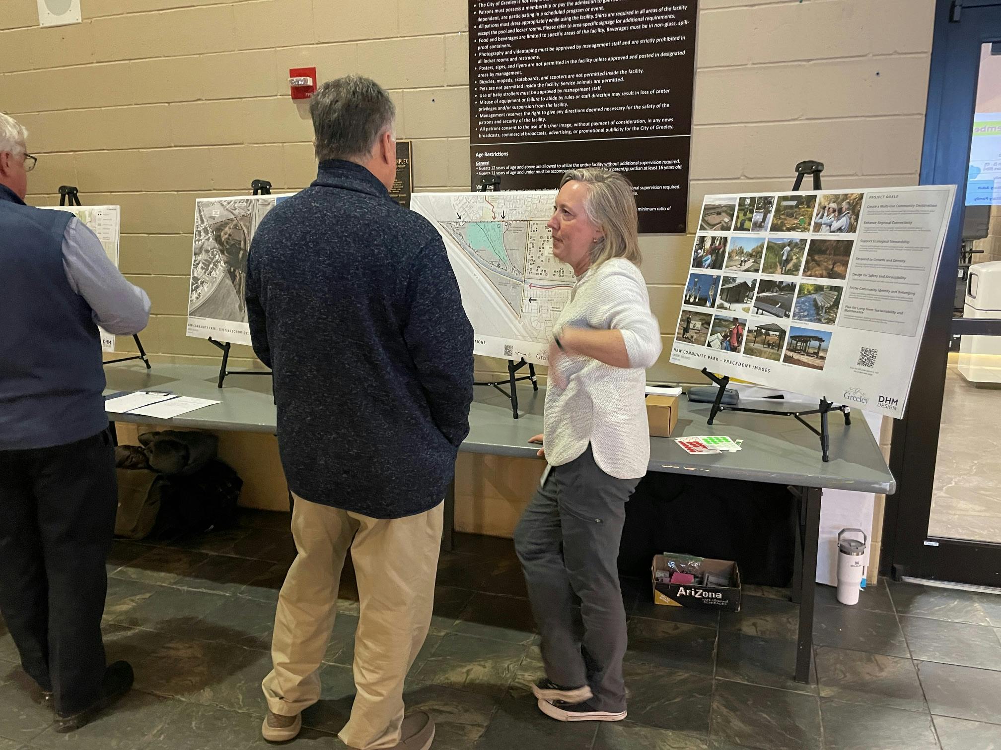 People viewing project boards and maps .JPG