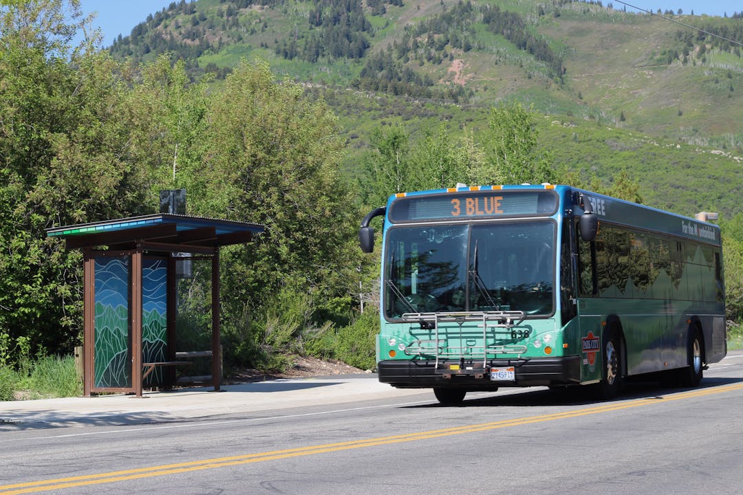 Park City bus driving past a bus stop shelter
