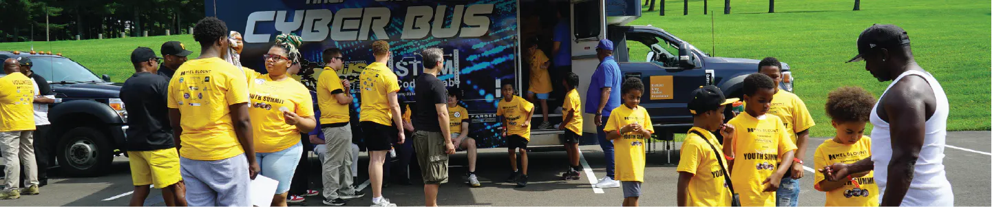 Pittsburgh area youth visit the HACP W.O.W. CyberBus during the 2025 Mel Blount Youth Leadership Initiative's Youth Summit.