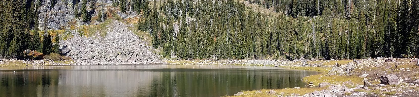 Sheridan Lake, one of the Rattlesnake Wilderness lakes acquired by the City of Missoula in 2017 through its purchase of the Mountain Water Company. The City maintains the lake's dam infrastructure.