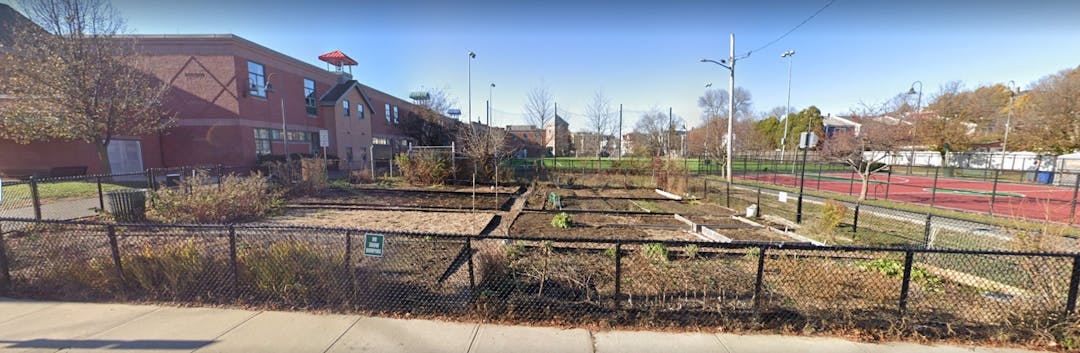 Existing Glen Park Community Garden plots with Capuano School in the background