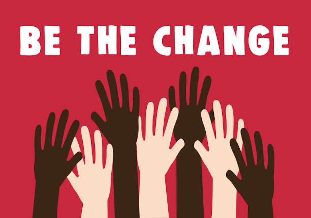 Many diverse hands are raised with the words Be the Change above them.