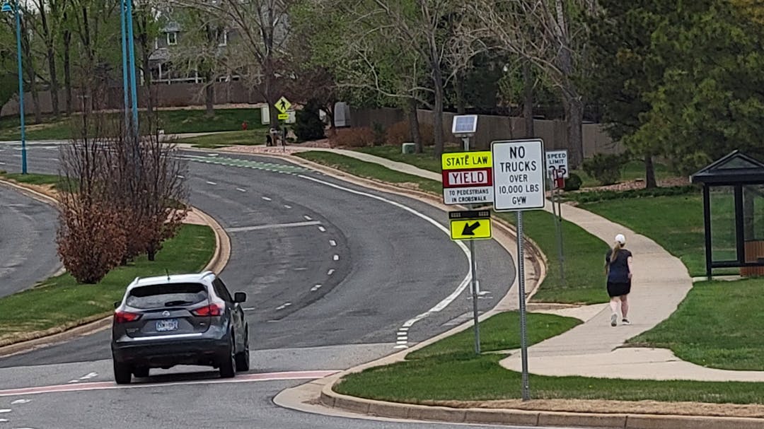 Image of residents driving and walking along Rock Creek Parkway