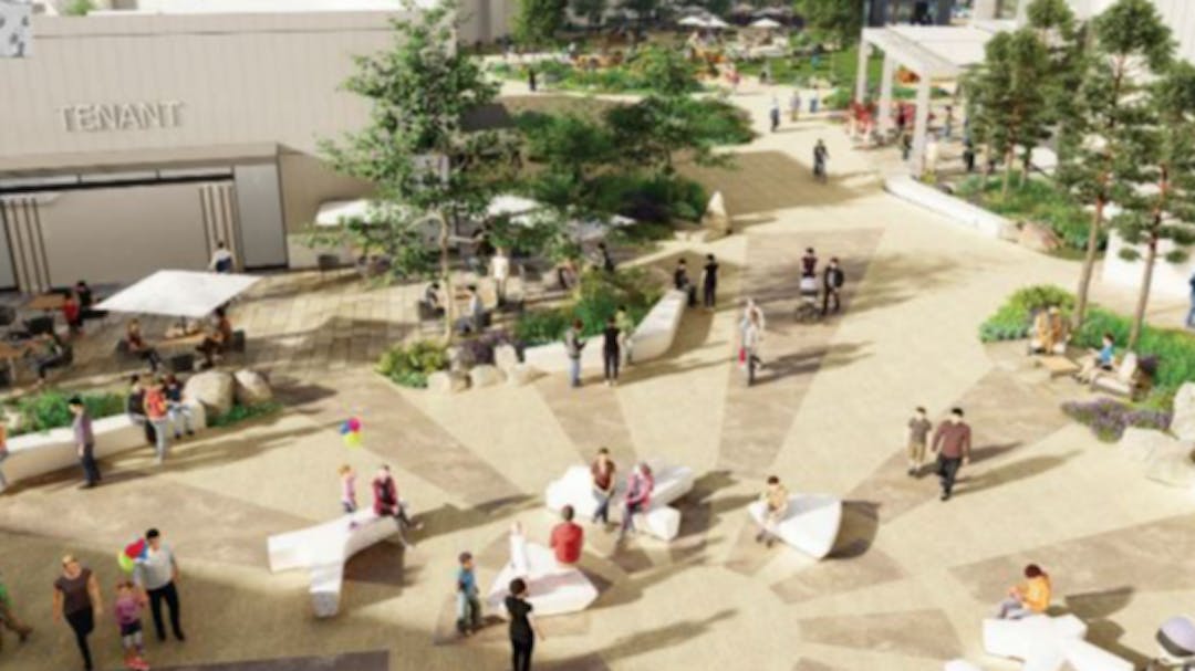 Color image depicting a birds eye view of the redeveloped public plaza with people gathered in the plaza.