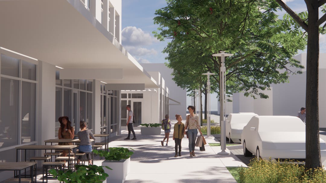 Rendering of a walkable street with a cafe with people to the left, people walking on the sidewalk, and parked cars on street