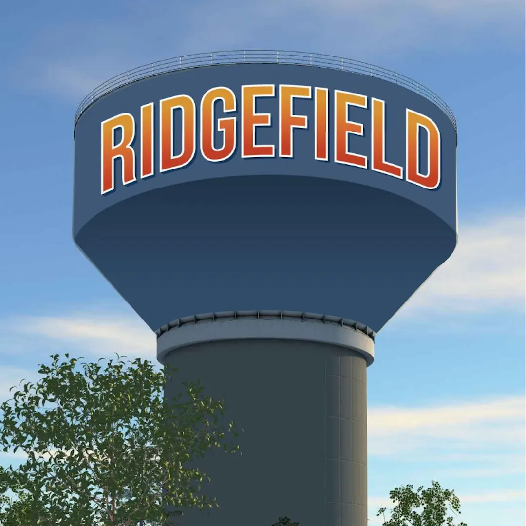 Elevated water reservoir with dark blue body and the text 'RIDGEFIELD' in orange.