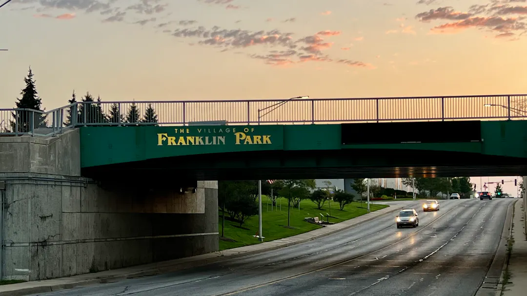 Photo of Village of Franklin Park Bridge and road underneath 
